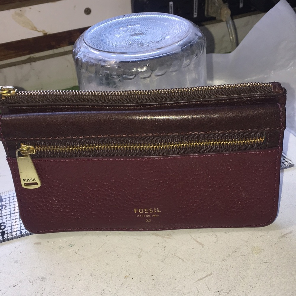 Fossil vintage burgundy pebbled leather check book length wallet.